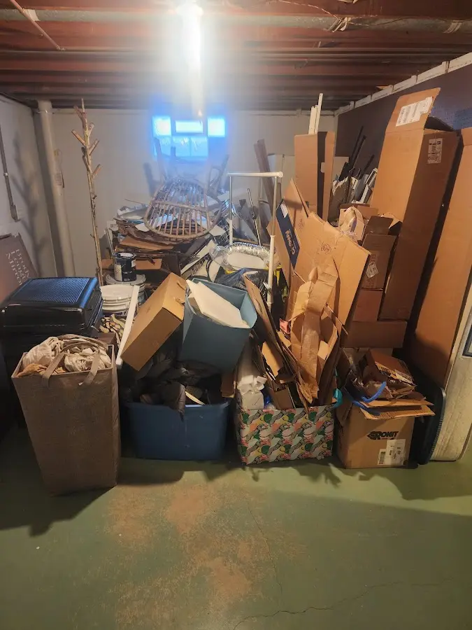 Roll-off dumpster container at job site for 4 Yard Dumpster Rental in Ainaloa